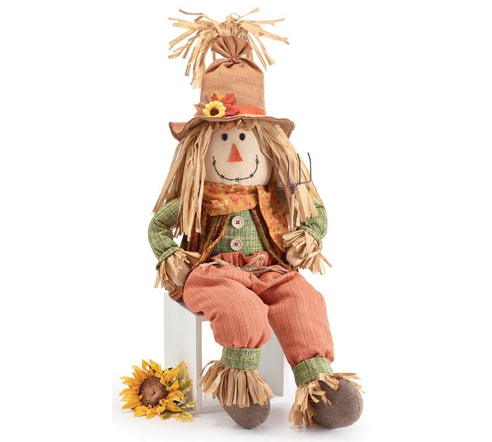SCARECROW WITH GREEN AND ORANGE CLOTHING