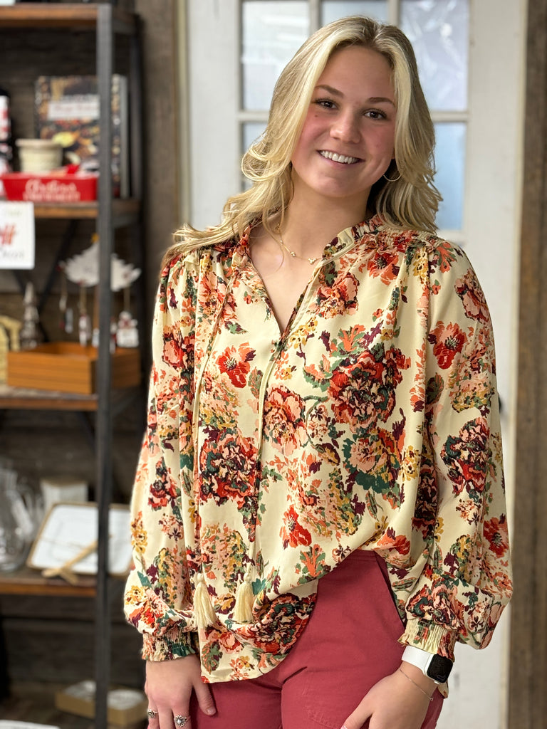 Cream Ruffle Blouse with Tassel