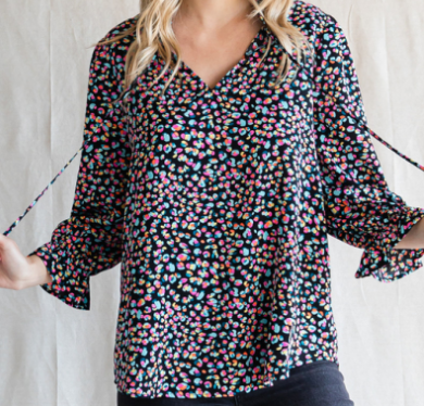 Print top with frilled self-tie neck