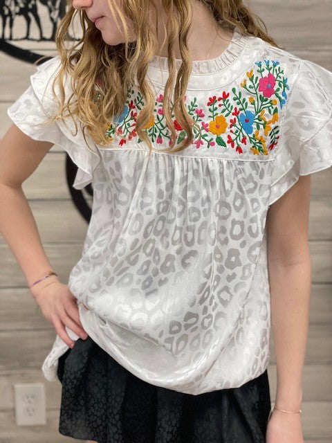 Satin leopard print top with a frill mock neckline